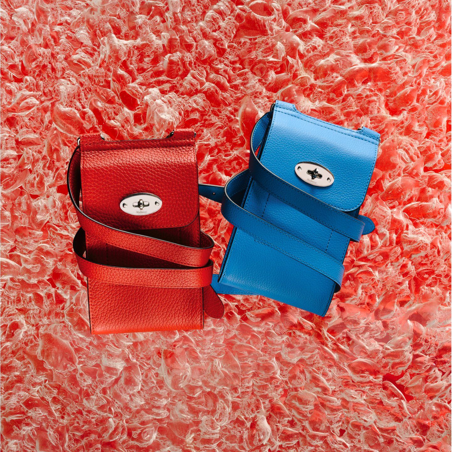 Two Mulberry Mini Antony bags in red and blue